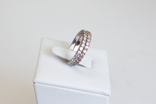 Load image into Gallery viewer, Two Classic 14k Diamond Band in white gold and yellow gold stacked atop one another, viewed from the side, on a white background.