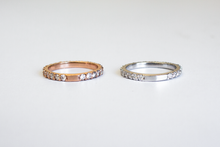 Load image into Gallery viewer, Two Classic 14k Diamond Band in white gold and yellow gold laid flat next to each other on a white background.
