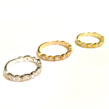 Load image into Gallery viewer, Three Diamond Deco Stackable Ring in 14k yellow, white and rose Golds laid flat on a white background.
