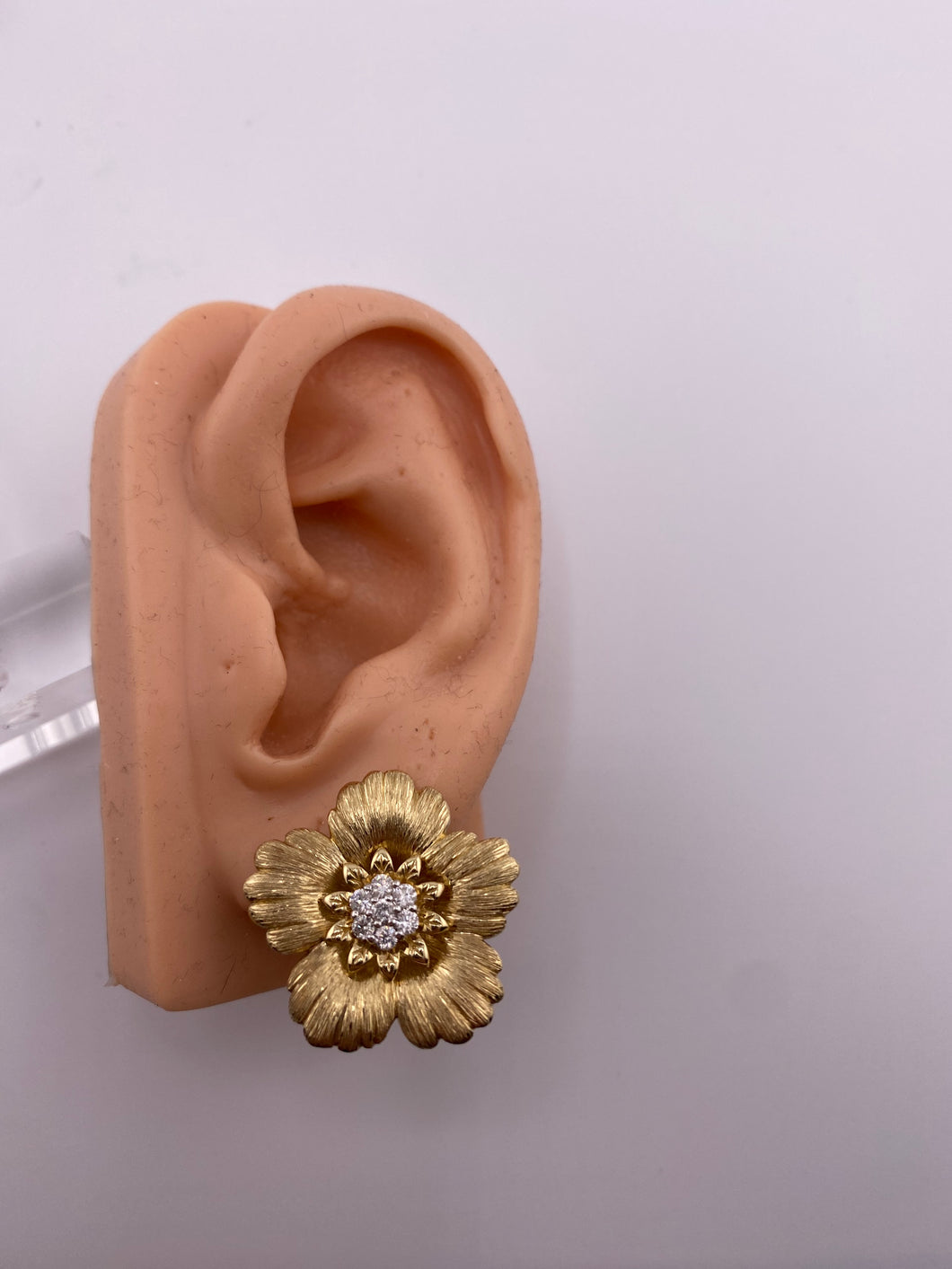 Gold Flower Earrings With a Diamond Center