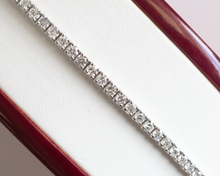 Load image into Gallery viewer, 5 Carat Diamond Tennis Bracelet in white gold laid flat in a box on a white background.
