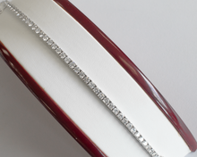 Load image into Gallery viewer, 6 Carat Diamond Tennis Bracelet in white gold laid flat in a box on a white background.
