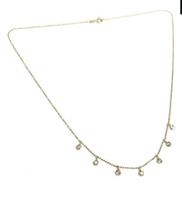 Load image into Gallery viewer, Diamond Dangle necklace in 14k yellow gold laid flat on a white background.
