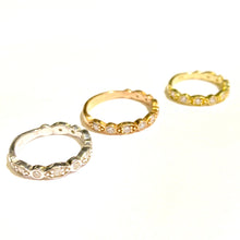 Load image into Gallery viewer, Three Diamond Deco Stackable Ring in 14k yellow, white and rose Golds laid flat on a white background.
