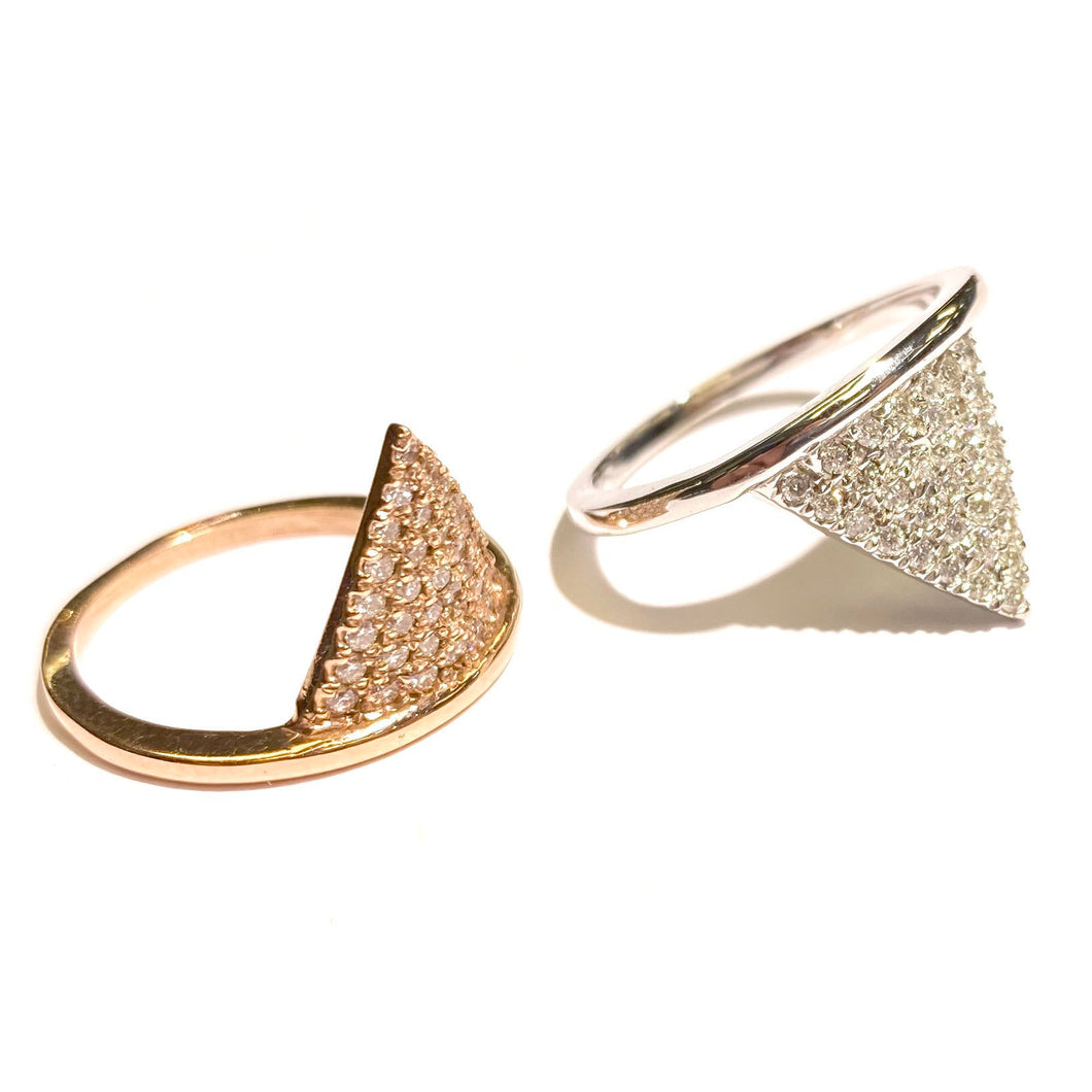Two Diamond Spike Ring in 14k yellow and white Gold on a white background.