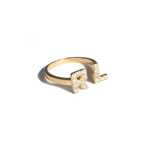 Double Initial Diamond Ring in 14k Gold with initials 'R' and 'L' laid flat on a white background.
