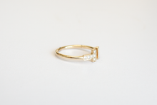 Load image into Gallery viewer, Side view of Miss Tiff Ring in 14k Yellow Gold and Diamonds laid flat on a white background.
