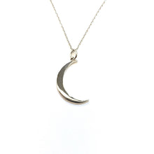 Load image into Gallery viewer, Moon Pendant in 14K Gold laid flat on a white background.
